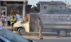 Çalkaladığı gazlı içecekle yangını söndürmeye çalıştı