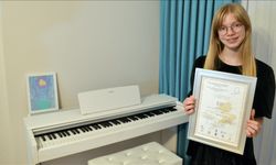 "Mutlak kulak" Aylin, uluslararası piyano yarışmasından birincilikle döndü