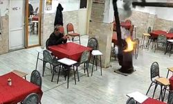 Denizli'de kolonya dökülmesi sonucu parlayan sobanın devrilme anı kamerada