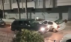 Camlarını kırdığı otomobile ışıklı çiçek buketi fırlattı; o anlar kamerada