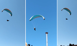 Mahallenin üstünden geçen paraşütçüyü çaya çağırdı