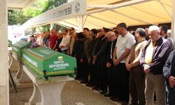 Oğulları tarafından öldürülen veteriner çift, toprağa verildi
