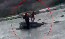 Çayın su seviyesi yükselince kayanın üzerinde mahsur kalan çocuk kurtarıldı