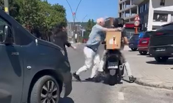 Kartal'da motokuryeyle kavga ederken aracını geri viteste unutan sürücü kaza yaptı