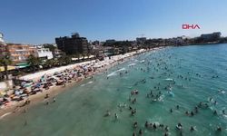 Aydın- Kuşadası'nda sıcak hava bunalttı; plajlar doldu