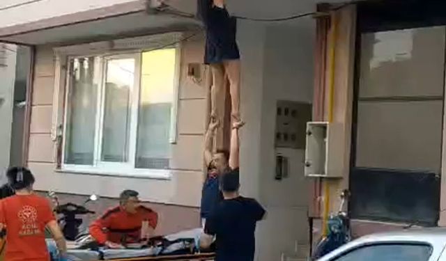 'İntihar' ihbarında bulundu, ekipler ayrılacağı sırada balkondan atlamaya kalkıştı
