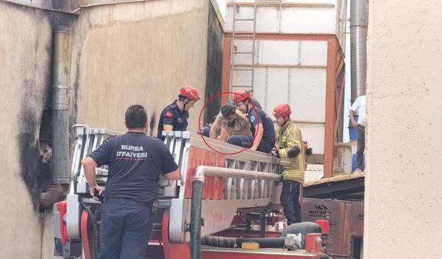 Temizlemeye girdiği talaş emme makinesine sıkışan işçiyi itfaiye kurtardı