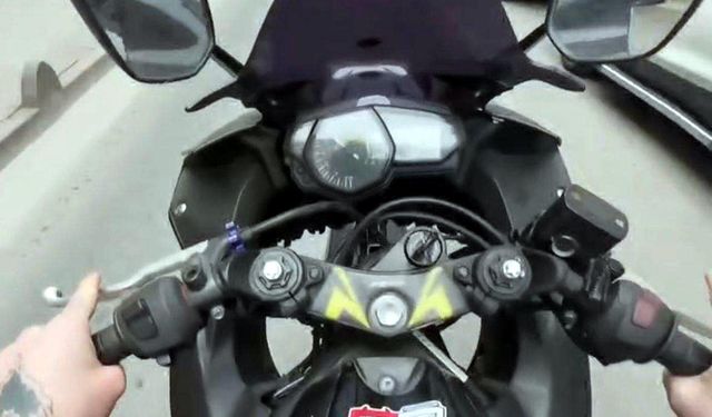 Tek tekerlek üzerinde ilerleyen motosikletin sürücüsüne 71 bin lira ceza